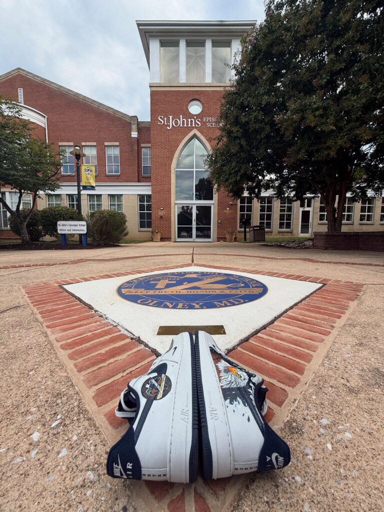 St. John's Episcopal School building entrance, with the school seal set into the plaza